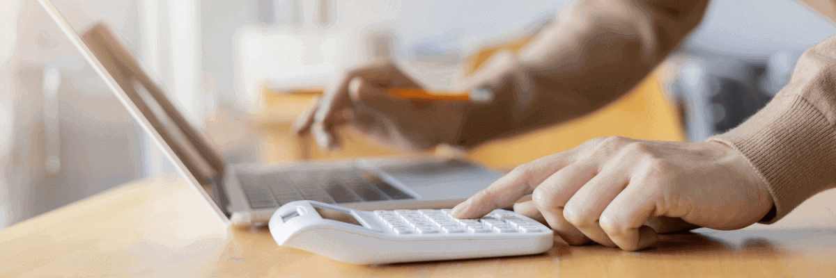 Person calculating bill