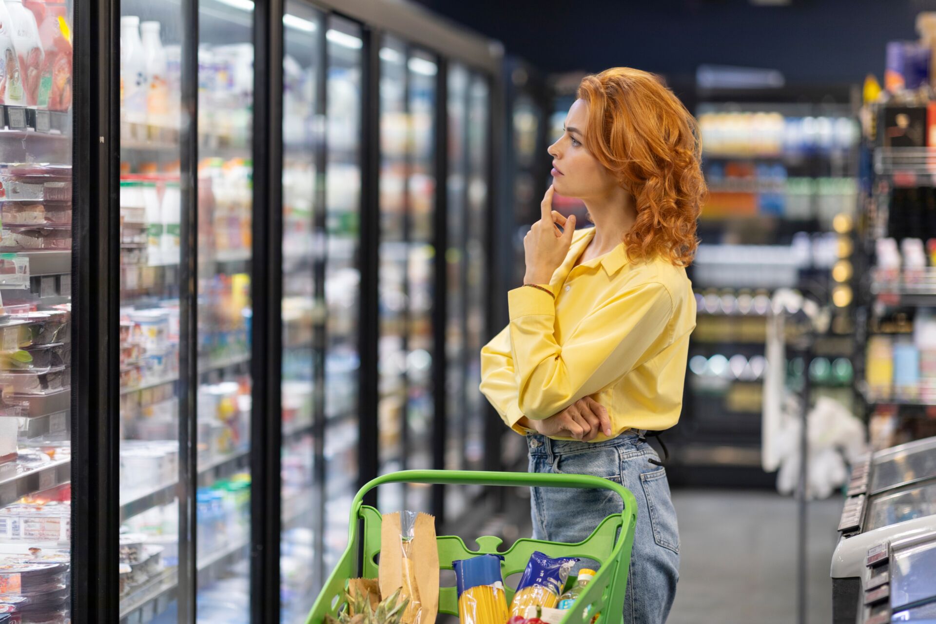 Woman-comparing-grocery-prices