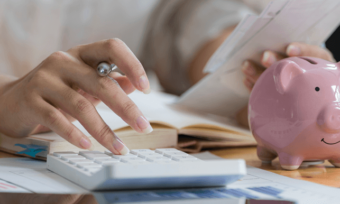 Woman paying high energy bills