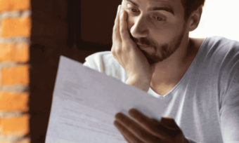 Man reading bill