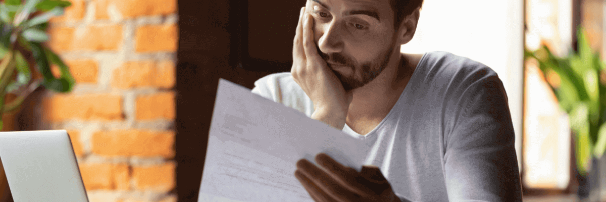 Man reading bill