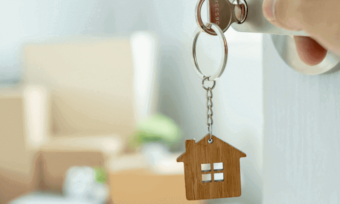 House keys opening door