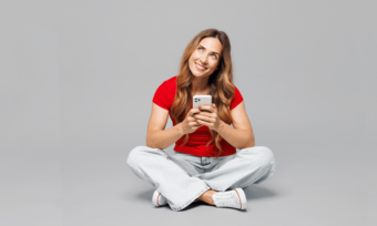 Woman using red mobile phone