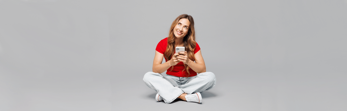 Woman using red mobile phone