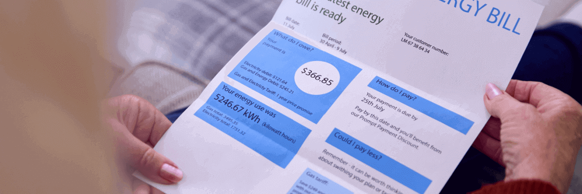 Lady's hand holding energy bill