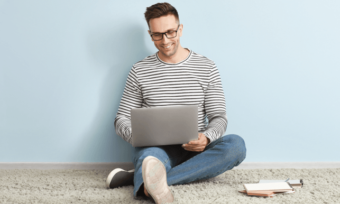 Man using laptop at home