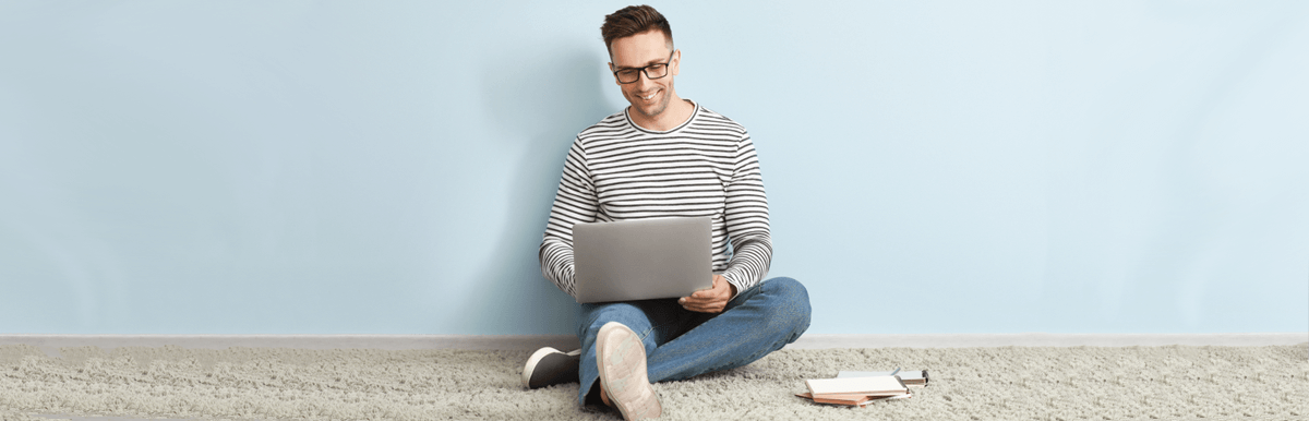 Man using laptop at home
