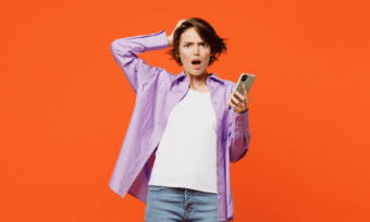 Upset woman with mobile phone. Price increase concept