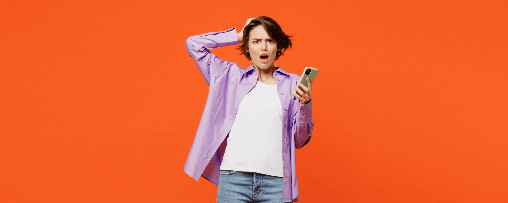 Upset woman with mobile phone. Price increase concept