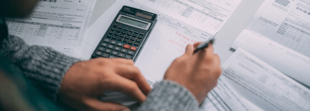 Homeowner paying electricity bill. Energy costs in VIC